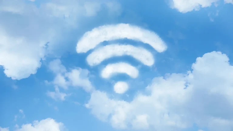 Clouds in shape of WI-FI symbol against blue sky
